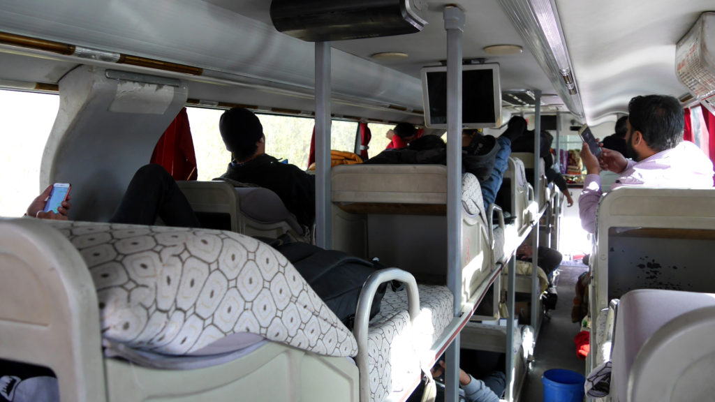 The bunkbeds in a Chinese sleeper bus are set in three rows