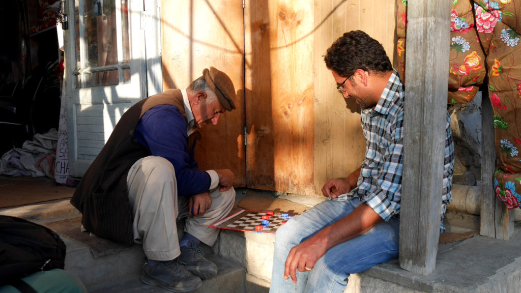 The game a bit similar to chess but played with bottle caps