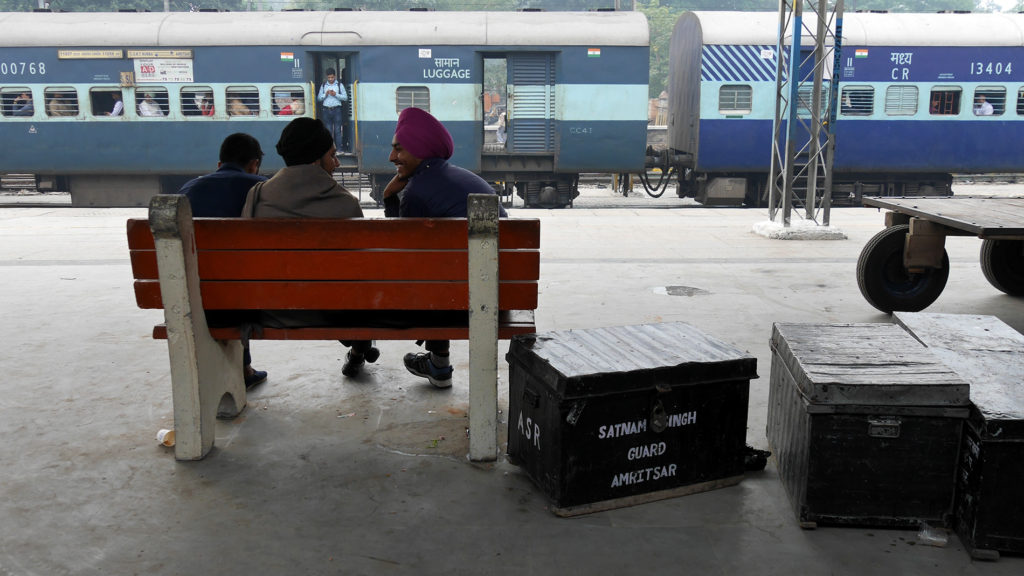 Sikh boys waiting for their train