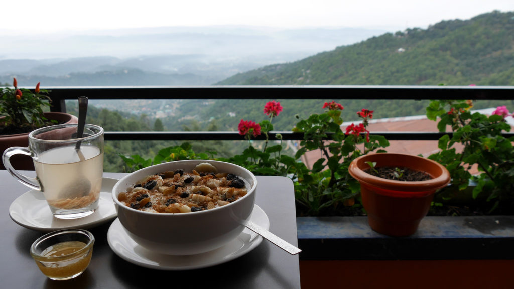 Breakfast porridge and ginger-lemon-honey at Om Cafe