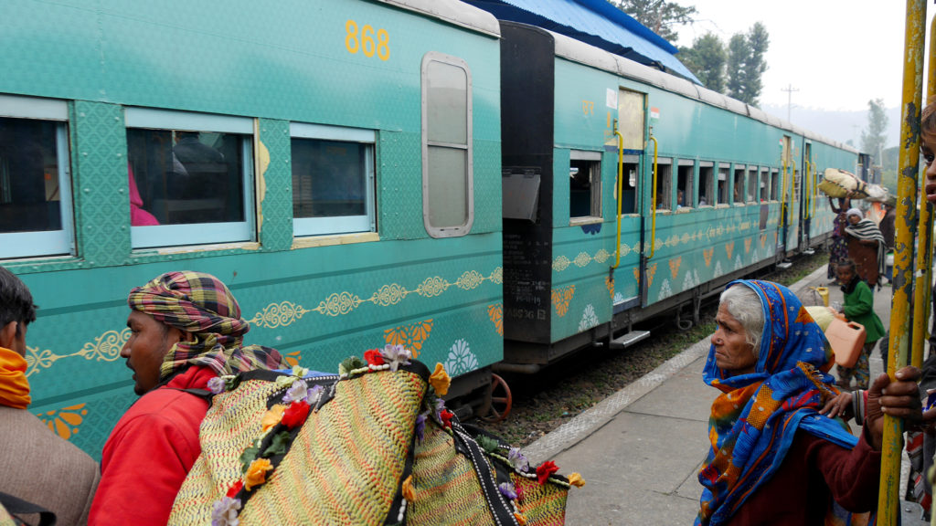 People boarding the narrow-gauge train