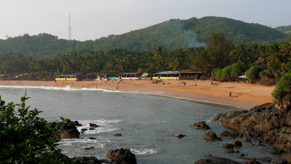 The right corner of the beach where most of the guesthouses are located