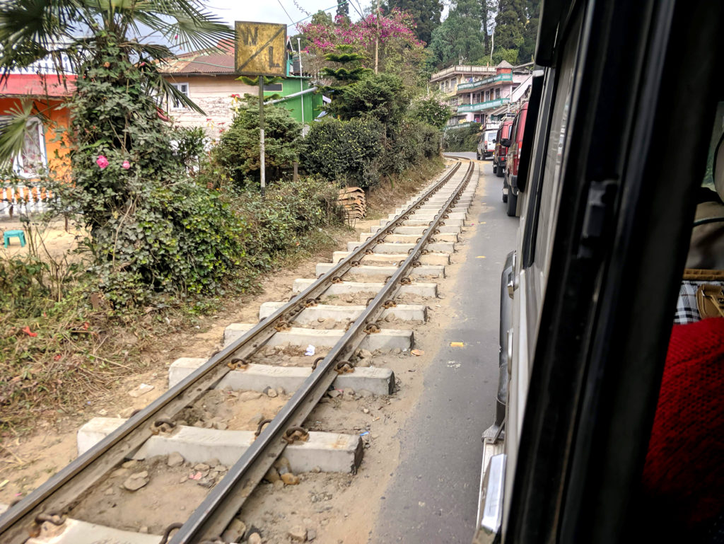 The train tracks were mostly running right next to the road