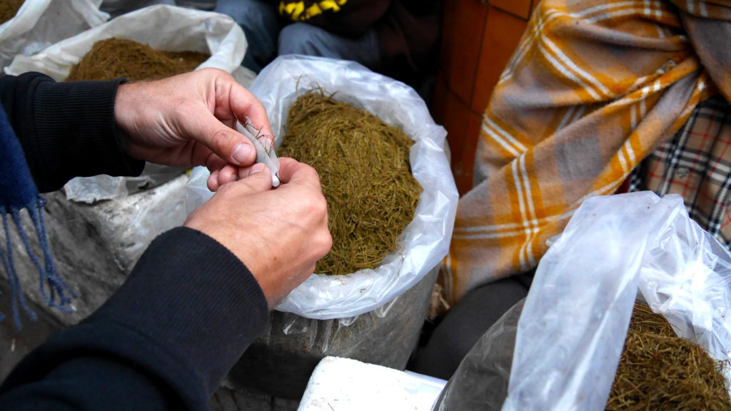 Rolling tobacco at Shillong market