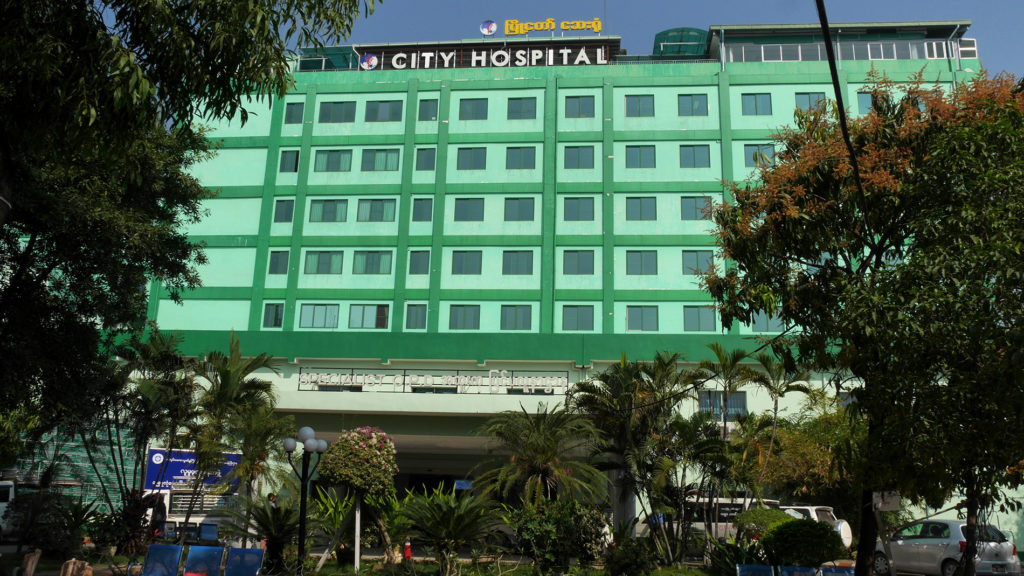 The Mandalay City Hospital seems to be an okay place to go if you need help in English