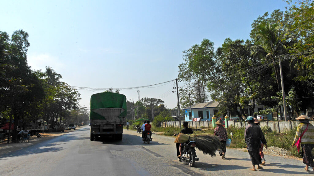 Motorbikes and trucks seem to be the most common vehicles on the old highway